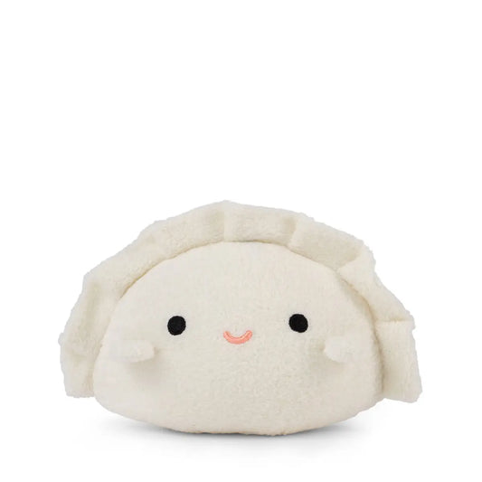 Plush toy resembling a dumpling with a smiling face on a white background