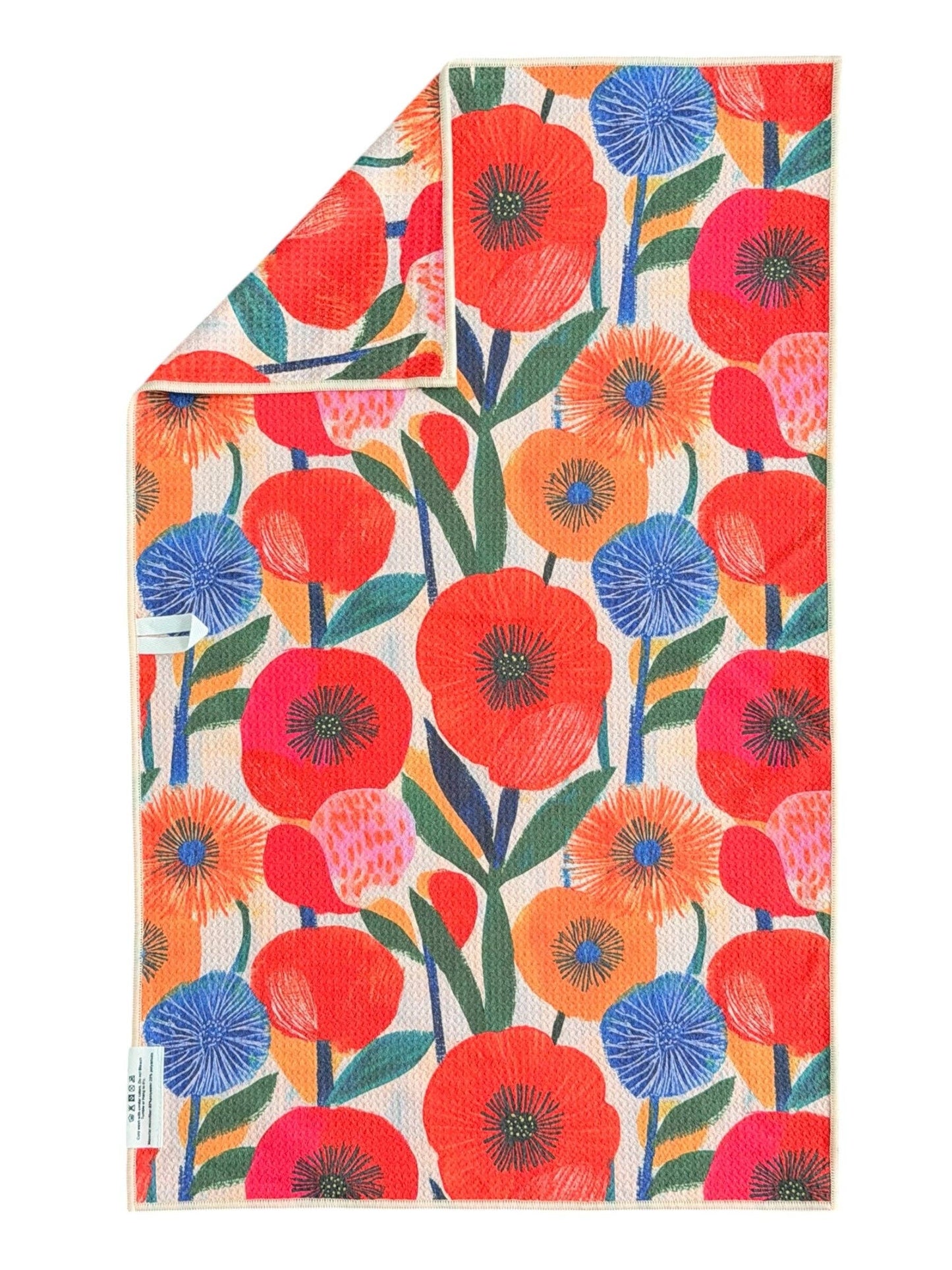 Floral patterned paper with red, blue, and orange flowers on a white background