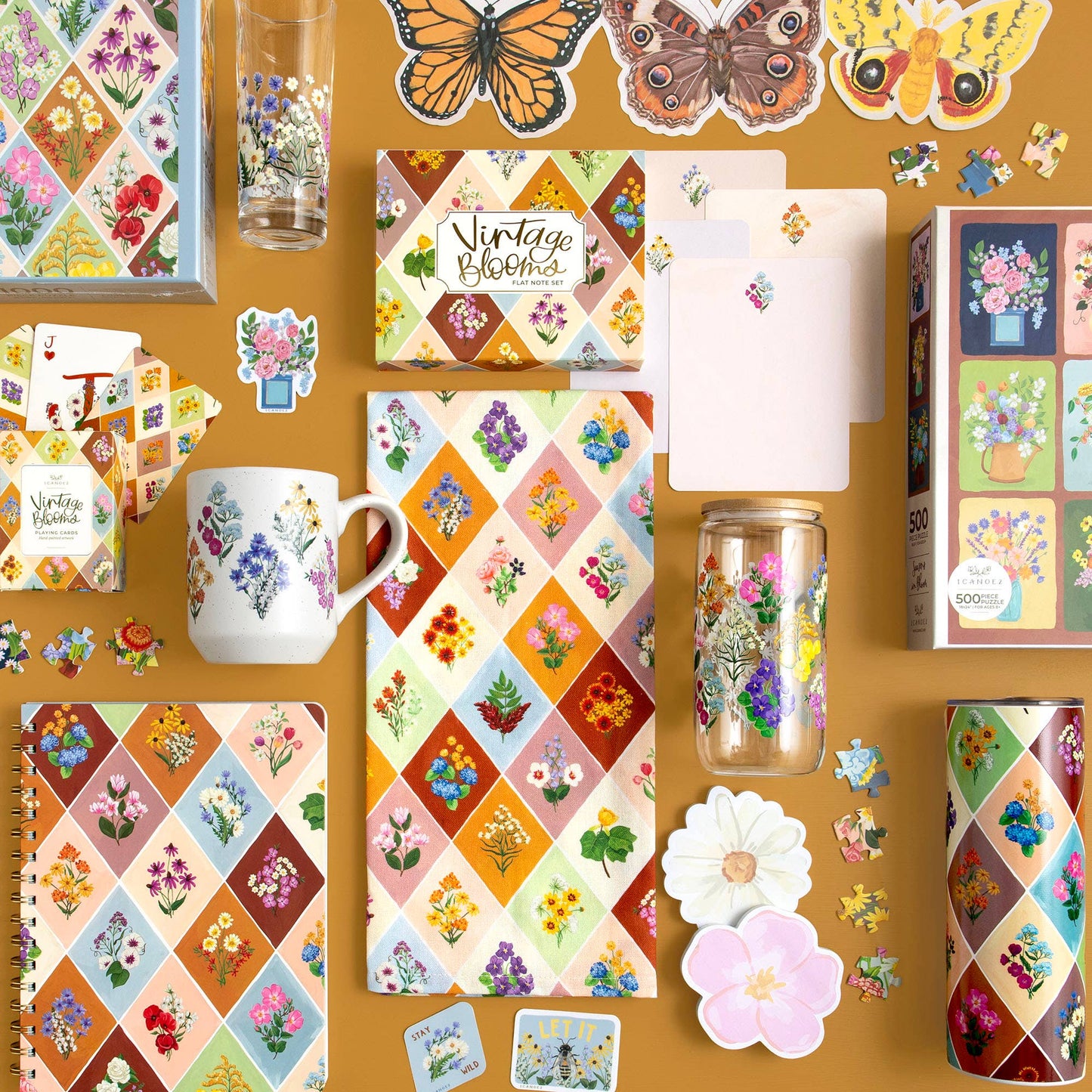 Collection of decorative items with floral patterns on a brown background
