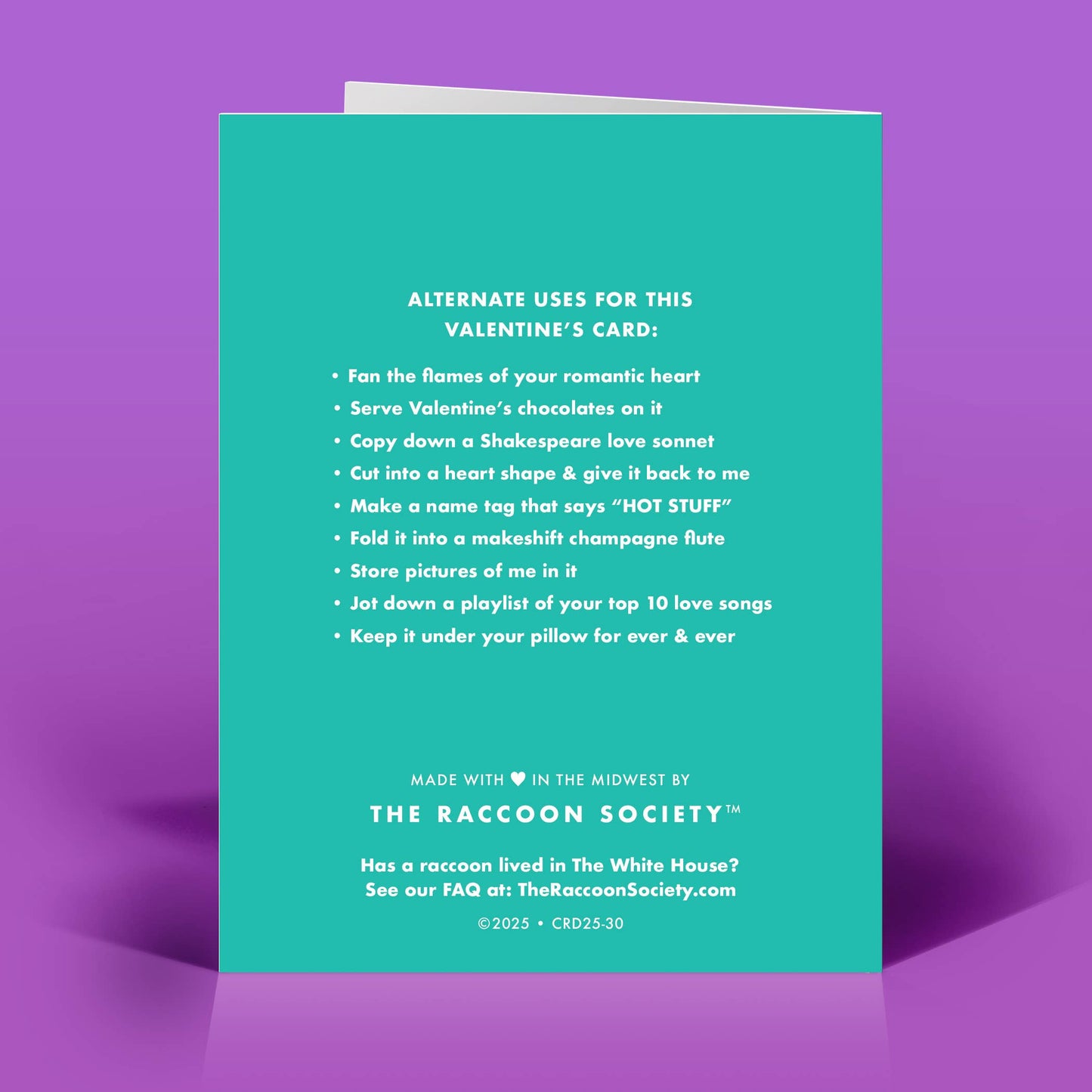Turquoise card with white text on a purple background