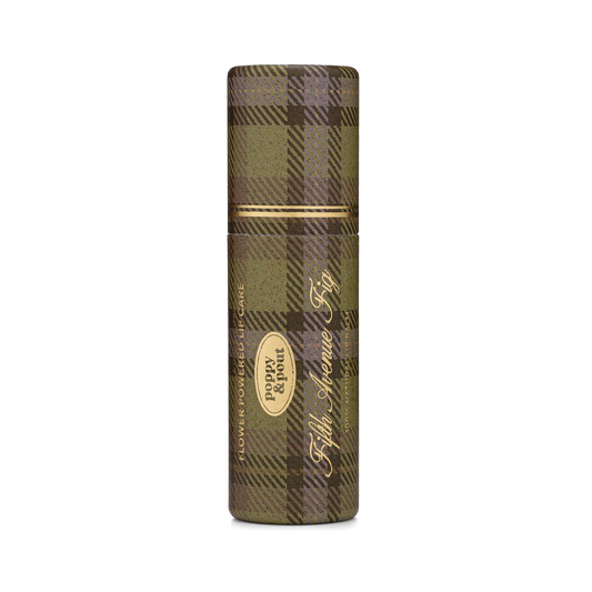 Lip balm with plaid packaging on a white background