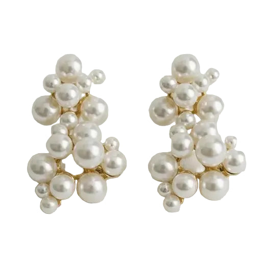 Pair of pearl earrings on a light background