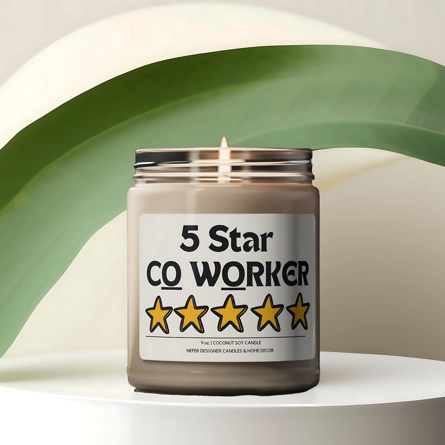 Candle with the text "5 Star Coworker" displayed on a white and green background