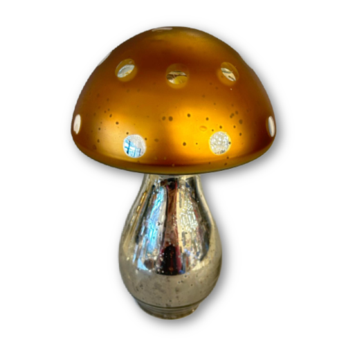 pictured is an 8.25 inch glass mushroom. The top is a frosted amber with mirrored glass dots, and the stem is mirrored glass.