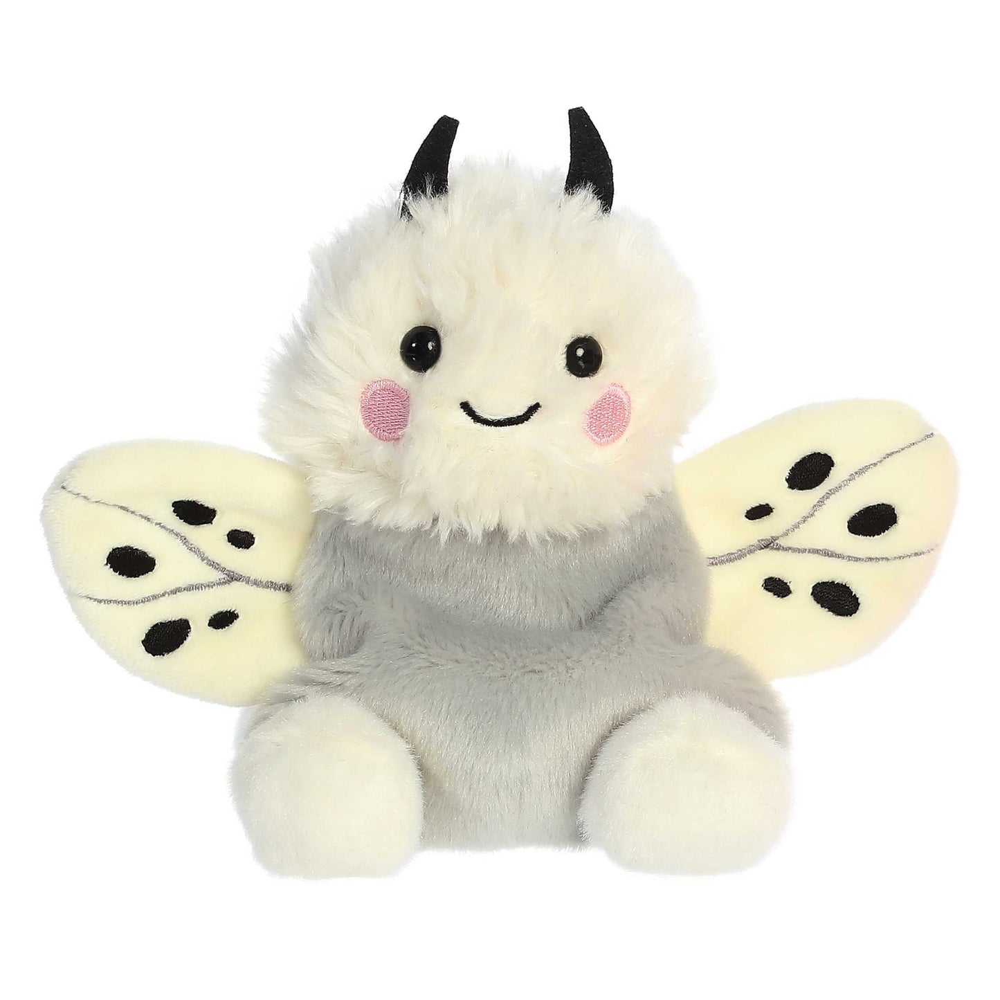 Plush toy moth with a white face and black antennae on a white background
