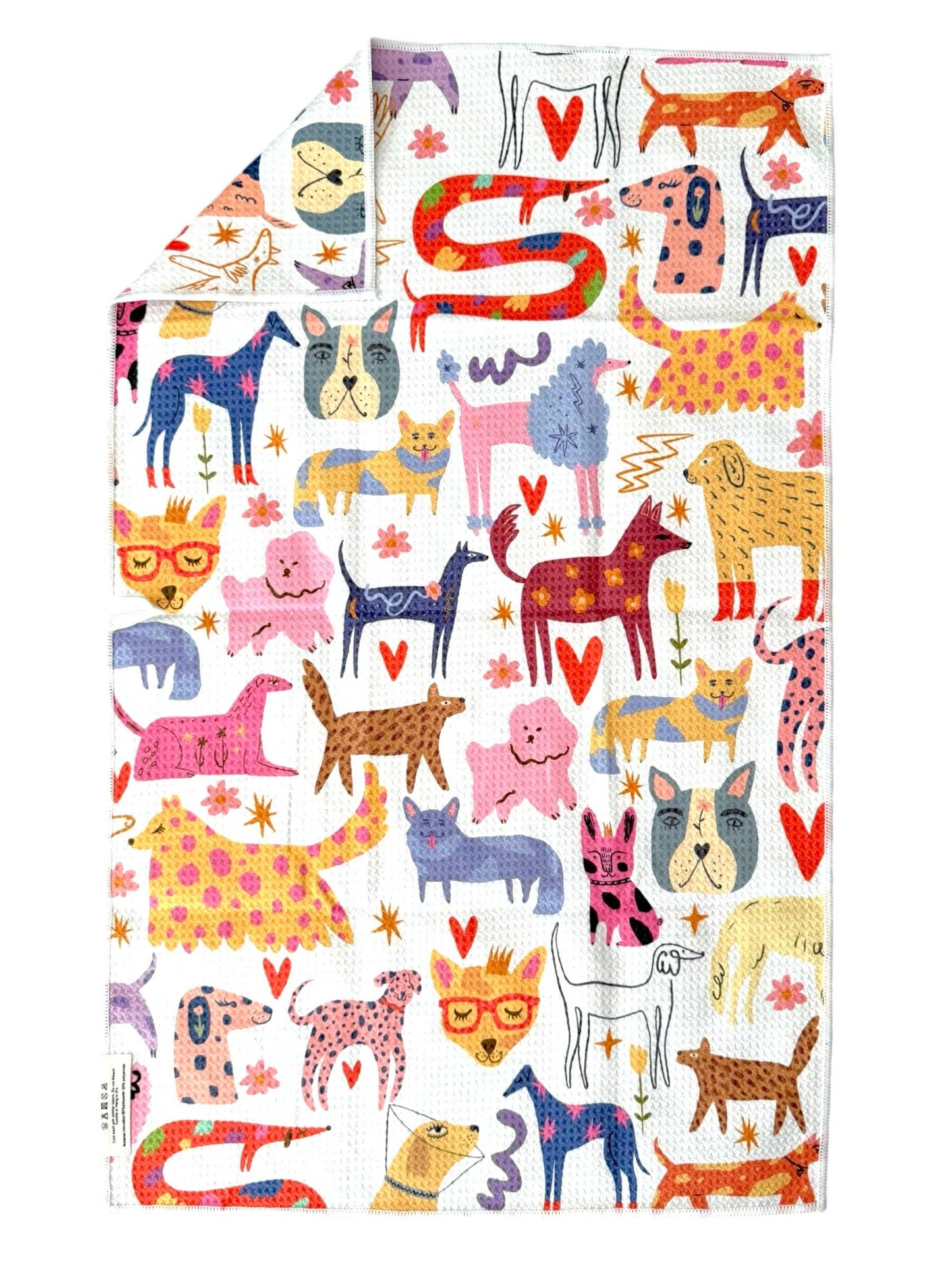 White tea towel with a colorful dog pattern