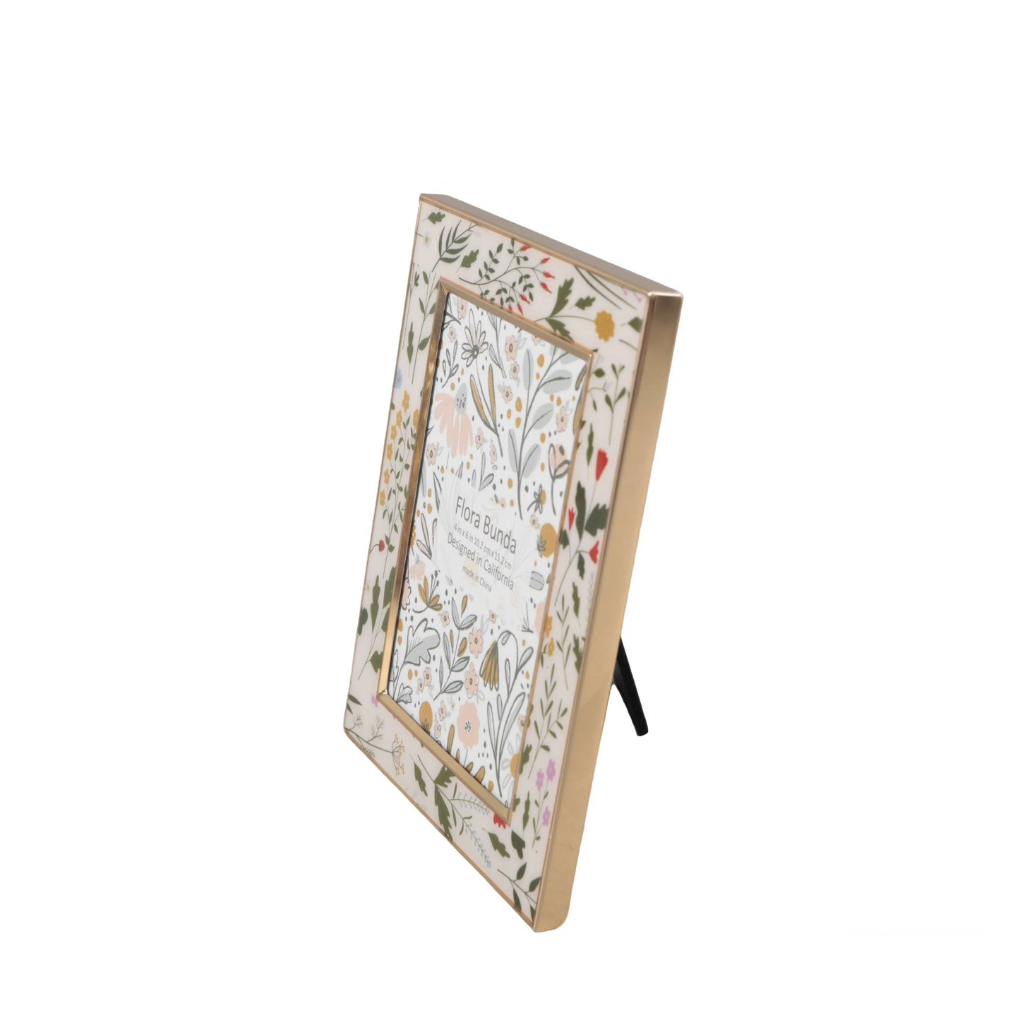 Side view of a decorative photo frame with floral design on a white background