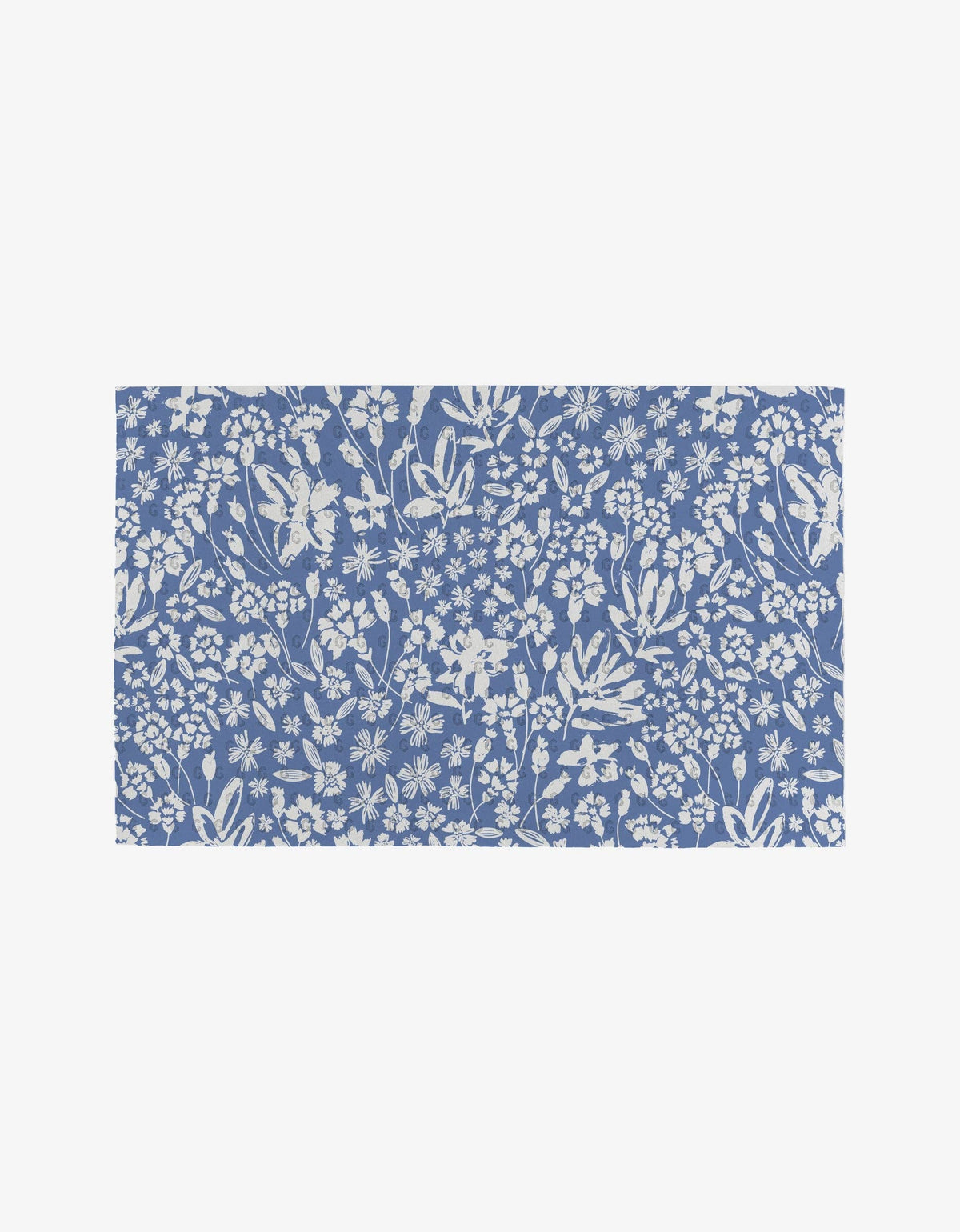 Blue fabric with white floral pattern on a white background