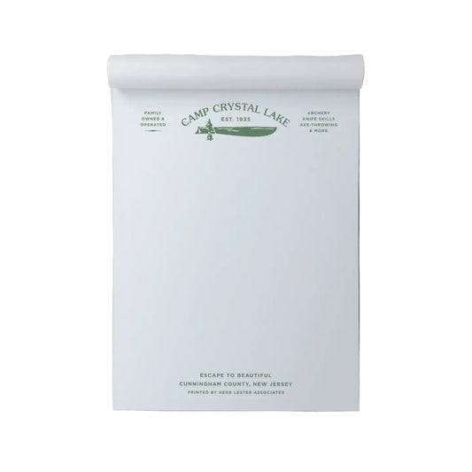Roll of paper with 'Camp Crystal Lake' branding