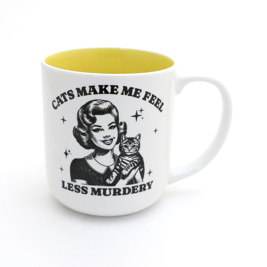 White and yellow mug with black vintage style graphics that read cats make me feel less murdery
