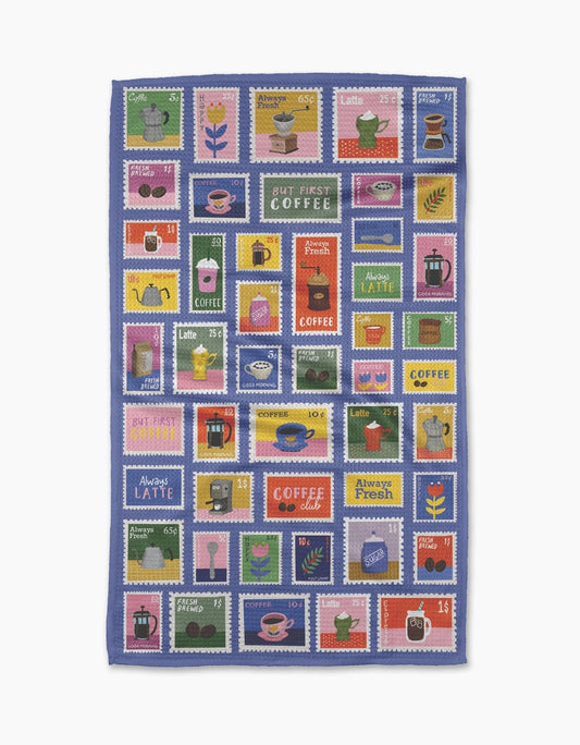 Tea towel with coffee-themed postage stamp designs on a blue background