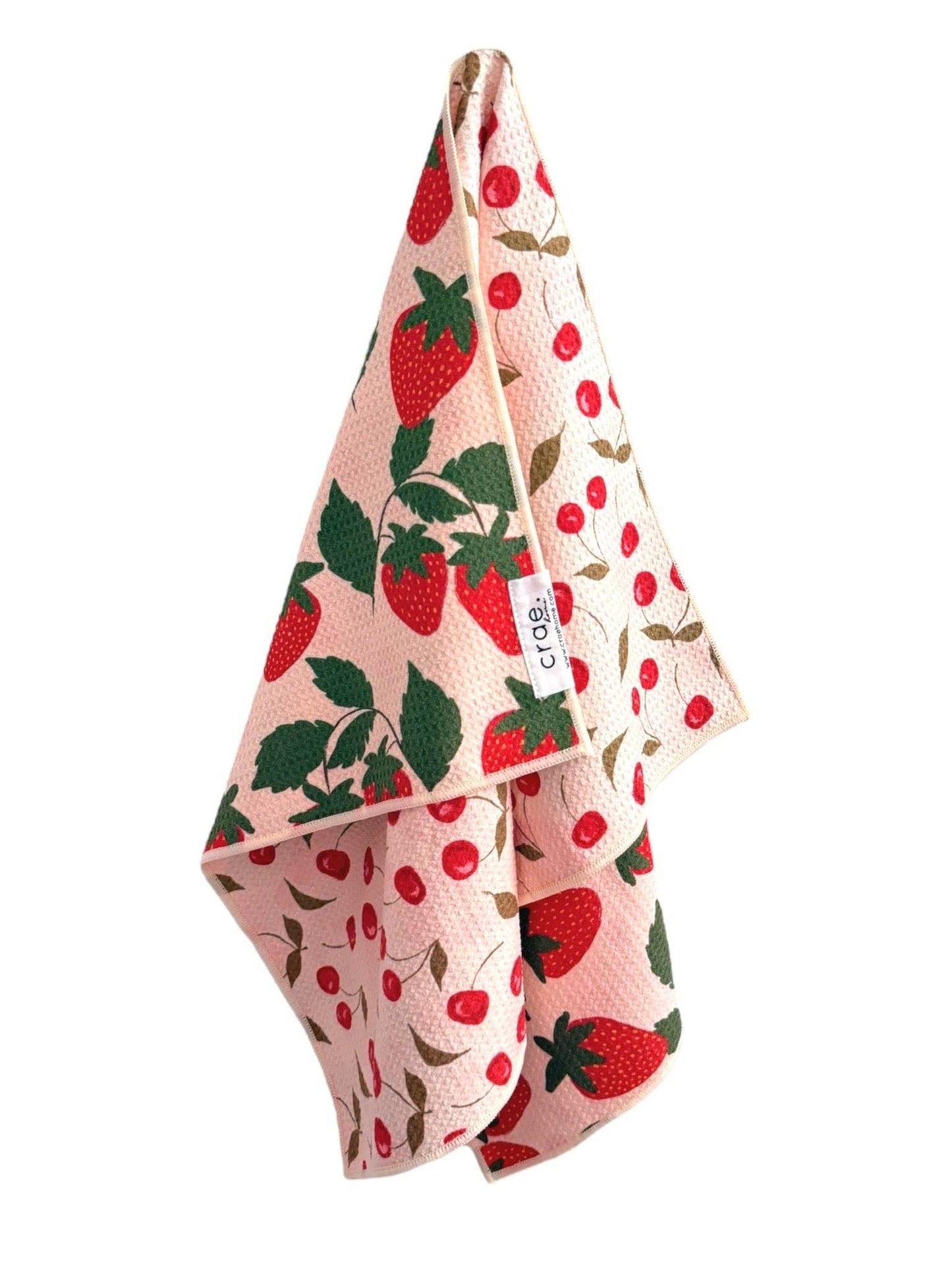 Kitchen towel with strawberry pattern on a white background