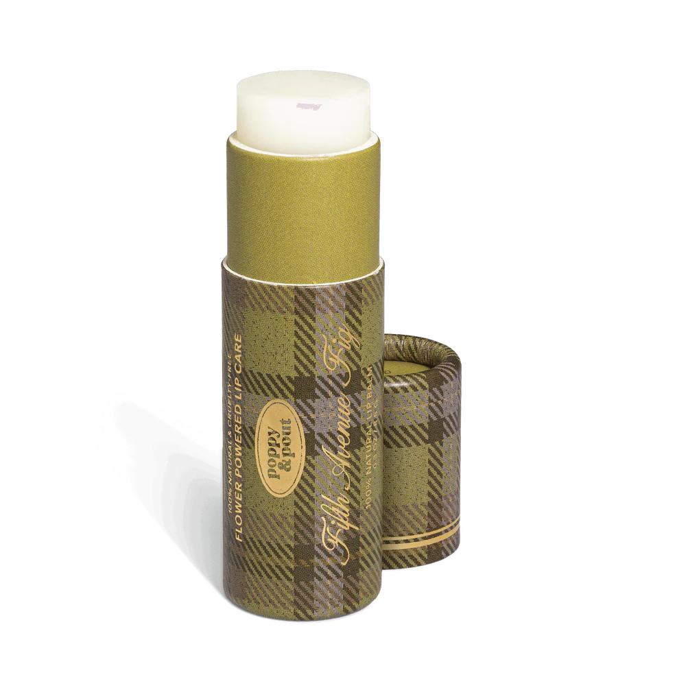 Lip balm with plaid packaging on a white background