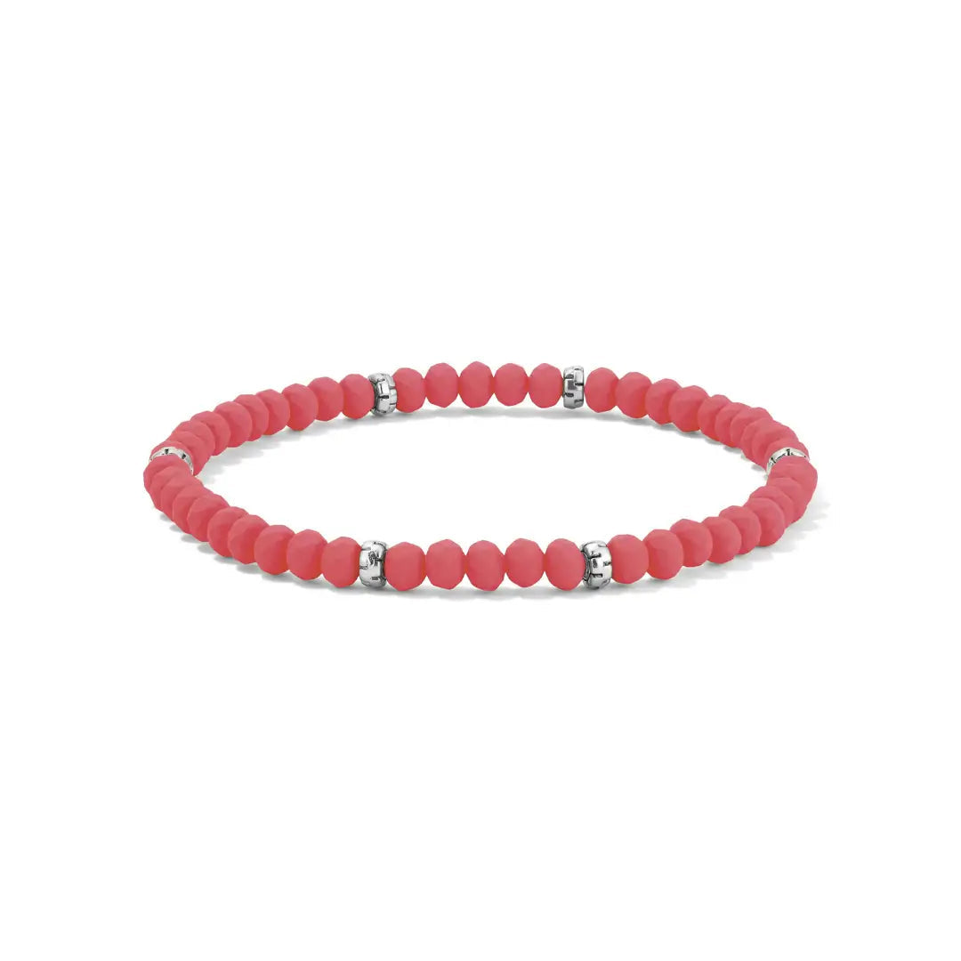 Neon flamingo pink beaded bracelet with silver accents on a white background