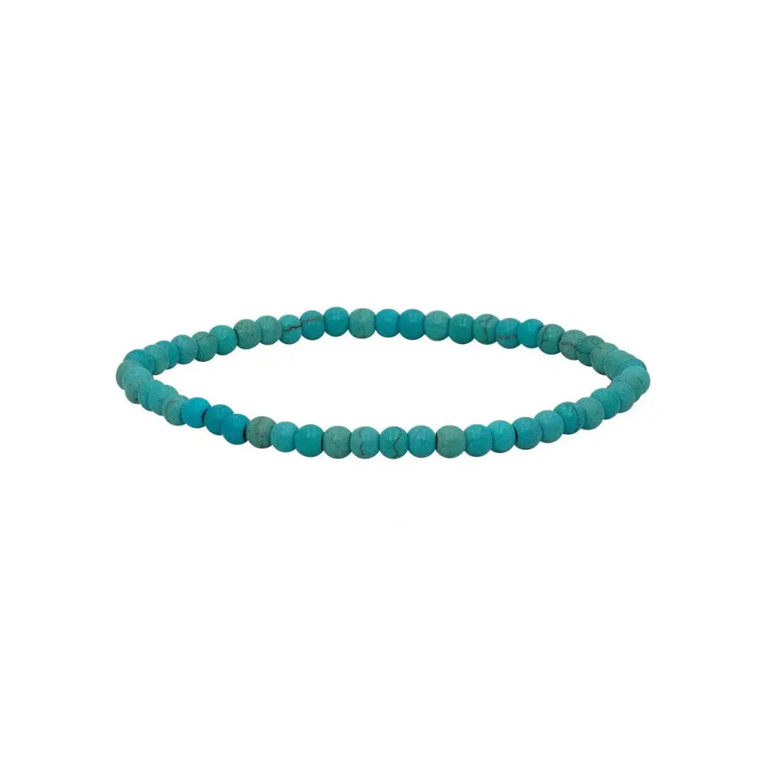 Turquoise beaded bracelet on a white background