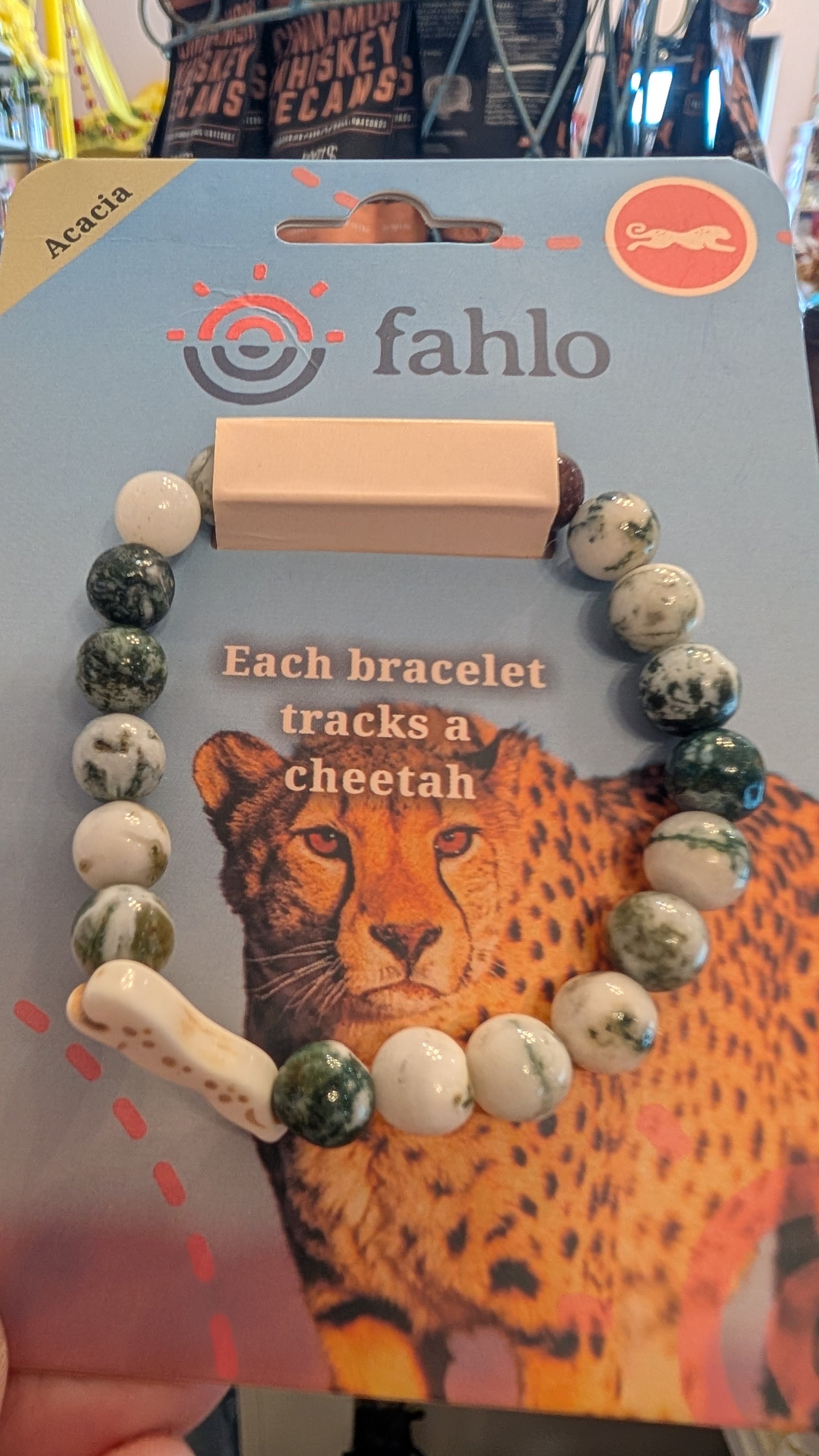 Bracelet with cheetah design on packaging, featuring the brand 'fahlo'.
