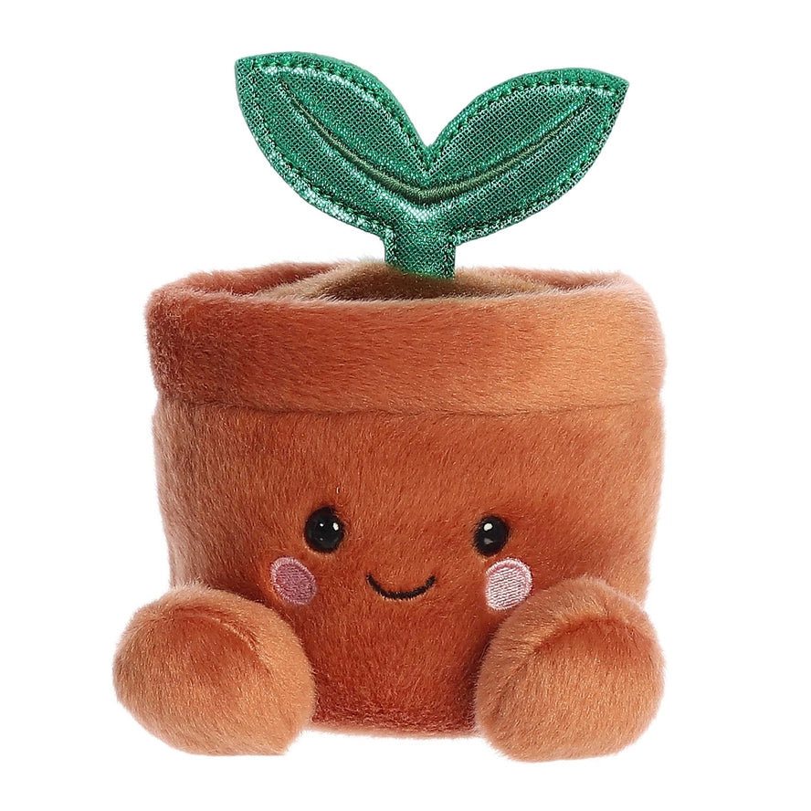 Plush toy resembling a potted plant with a smiling face on a white background