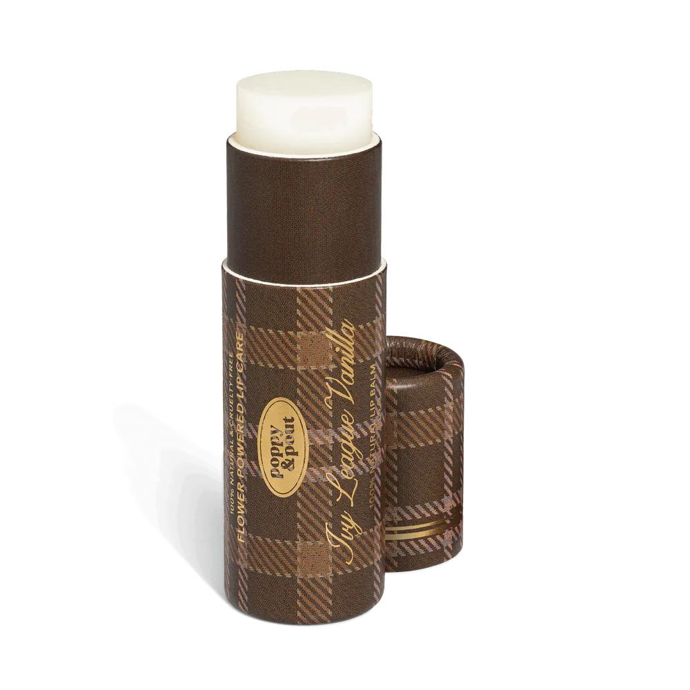 Lip balm with brown plaid design on a white background