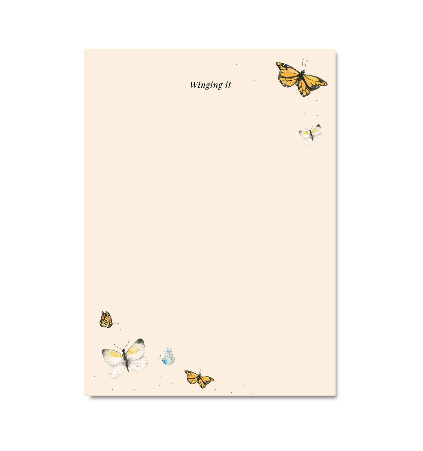 Notebook with butterfly illustrations and 'Winging it' text on a beige background