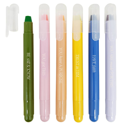 Set of six colorful highlighters with motivational phrases on a white background