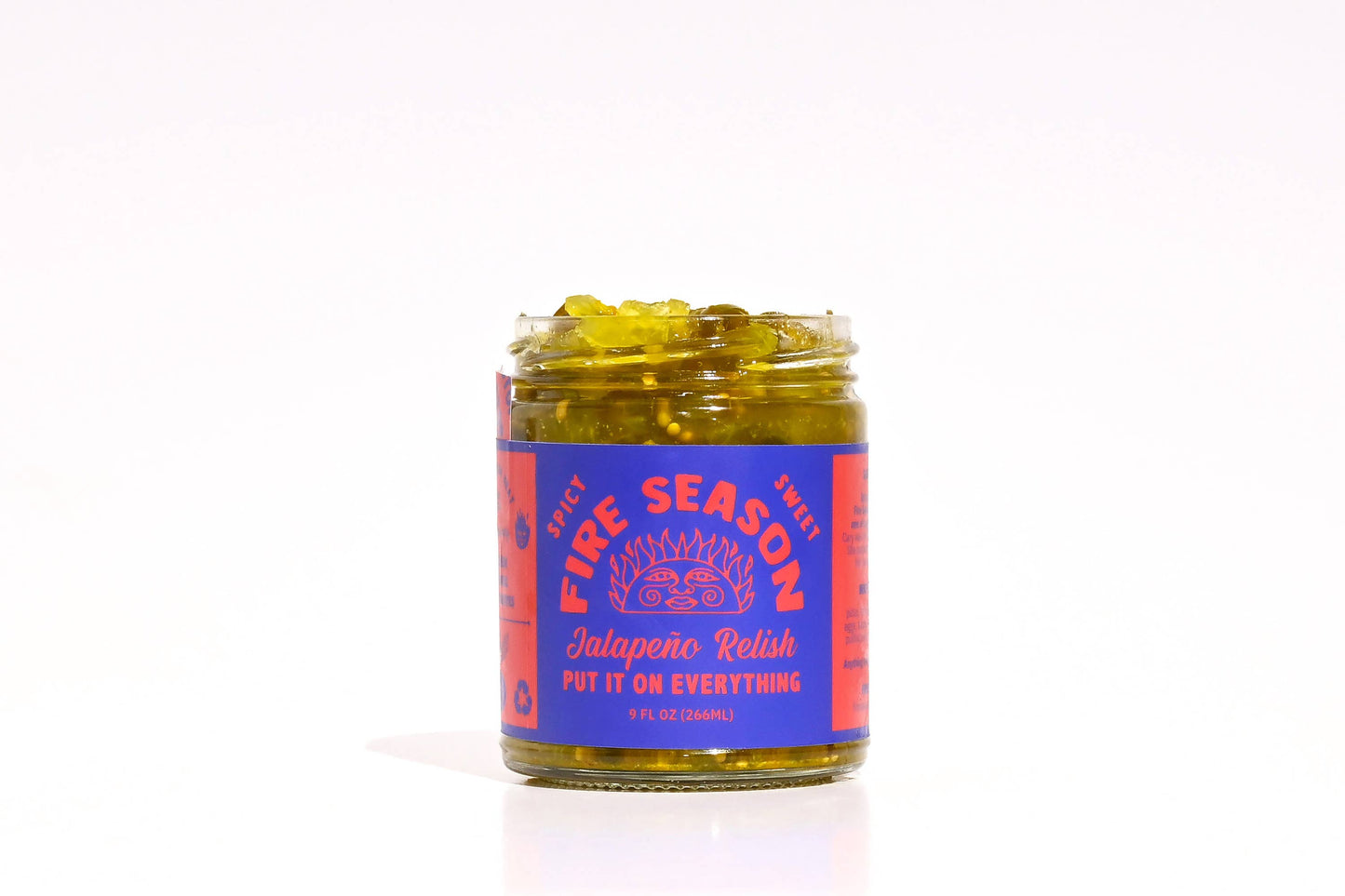 Jar of jalapeno peppers with a red label on a white background