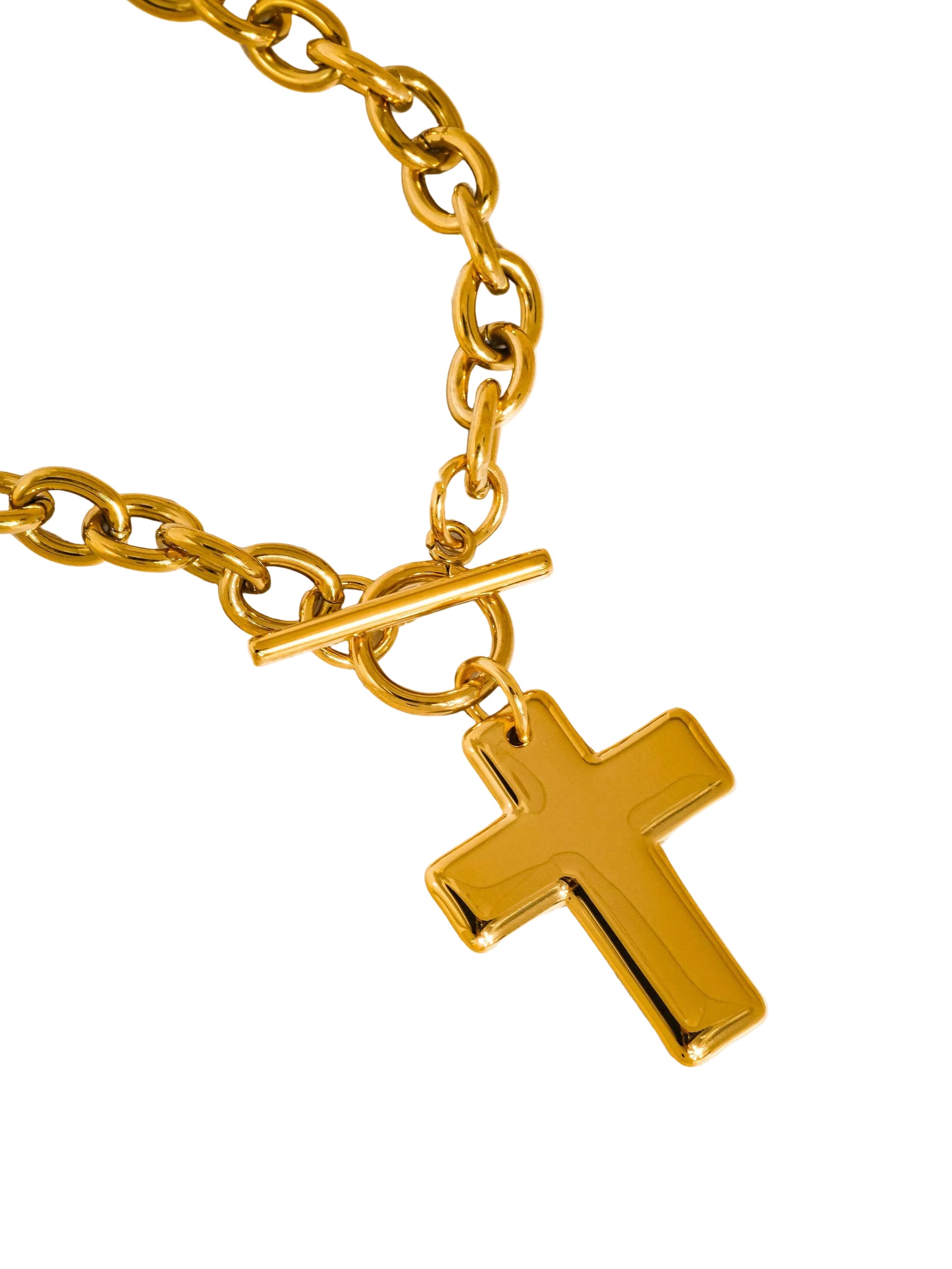 Gold chain bracelet with a gold cross pendant on a white background