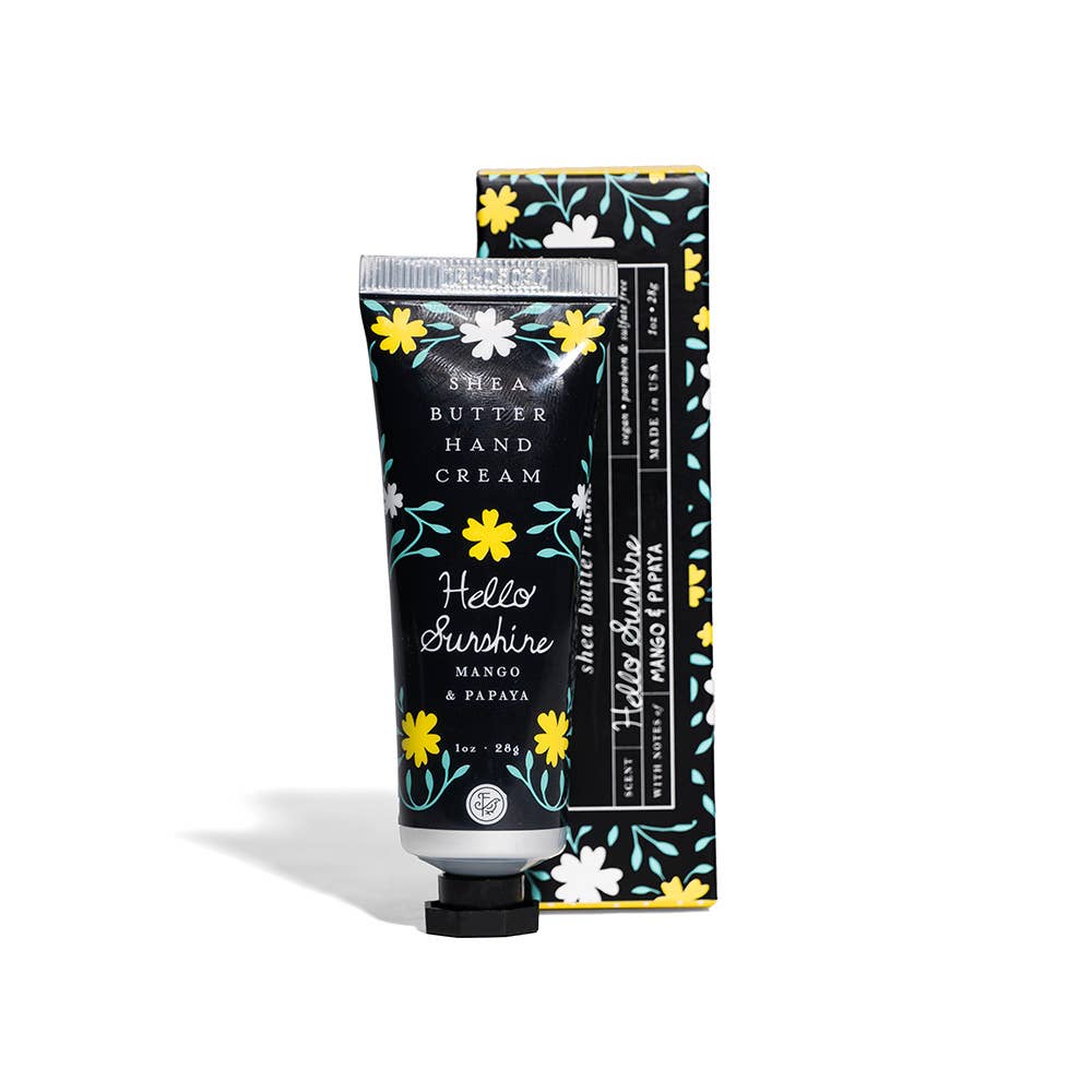 Shea butter hand cream with floral design packaging on a white background