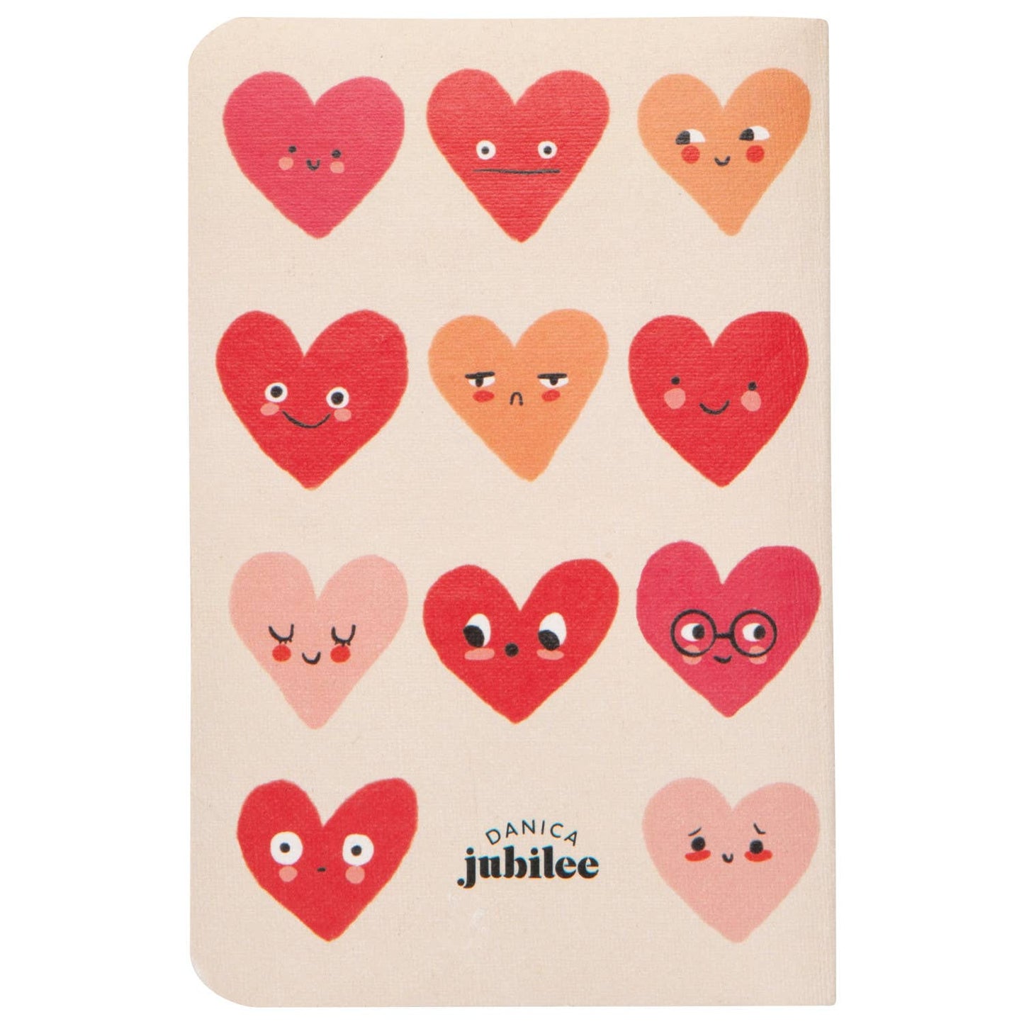 Notebook with heart-shaped designs on a beige background, featuring the brand 'Danica Jubilee'.