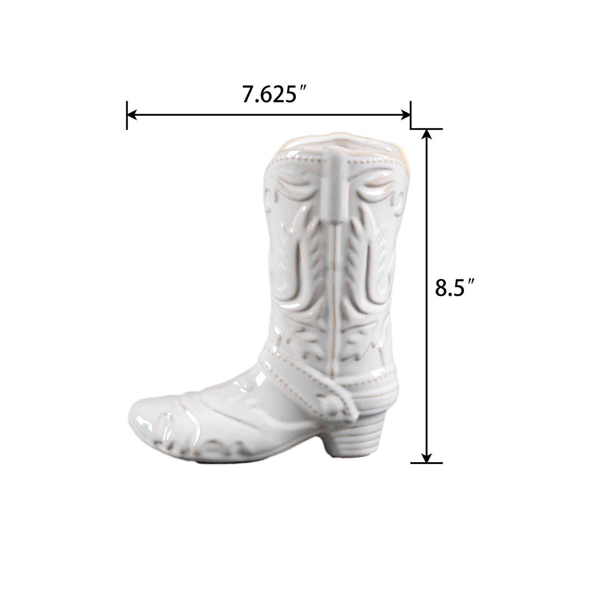 White ceramic cowboy boot with measurements on a white background (8.5” height x 7.625” width)