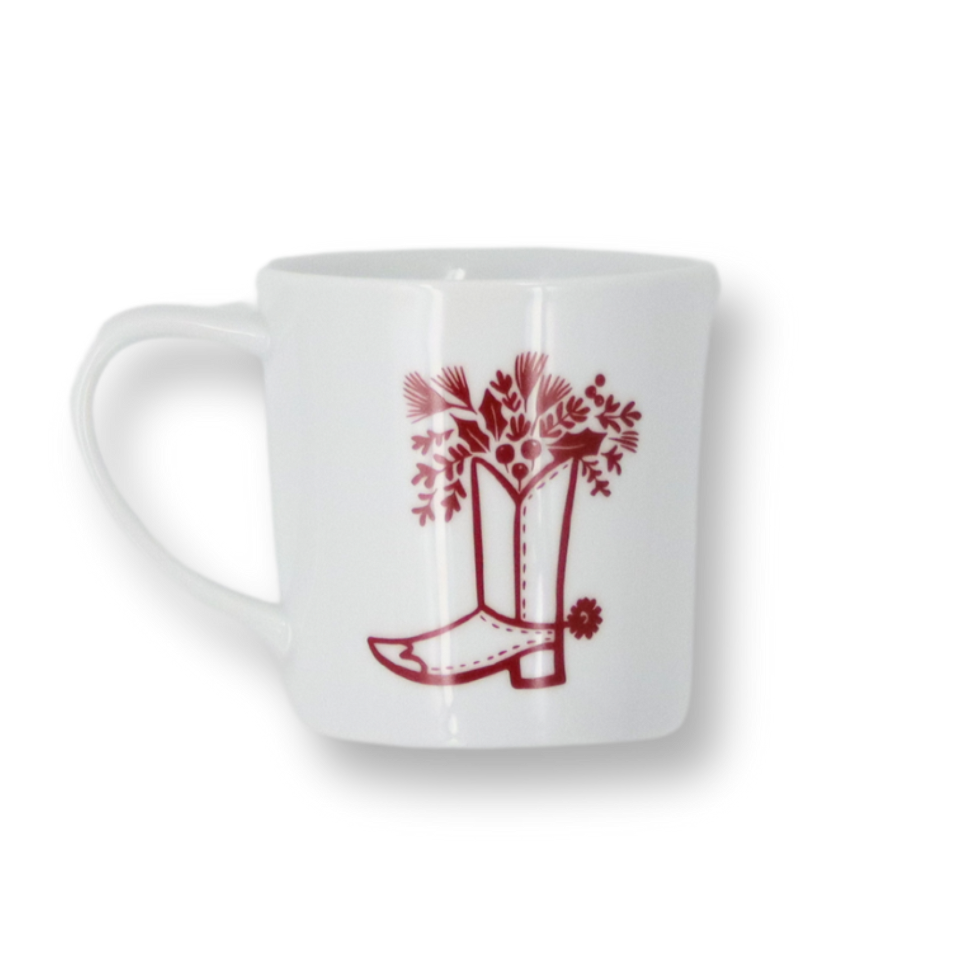 White mug with red boot and floral design on a white background