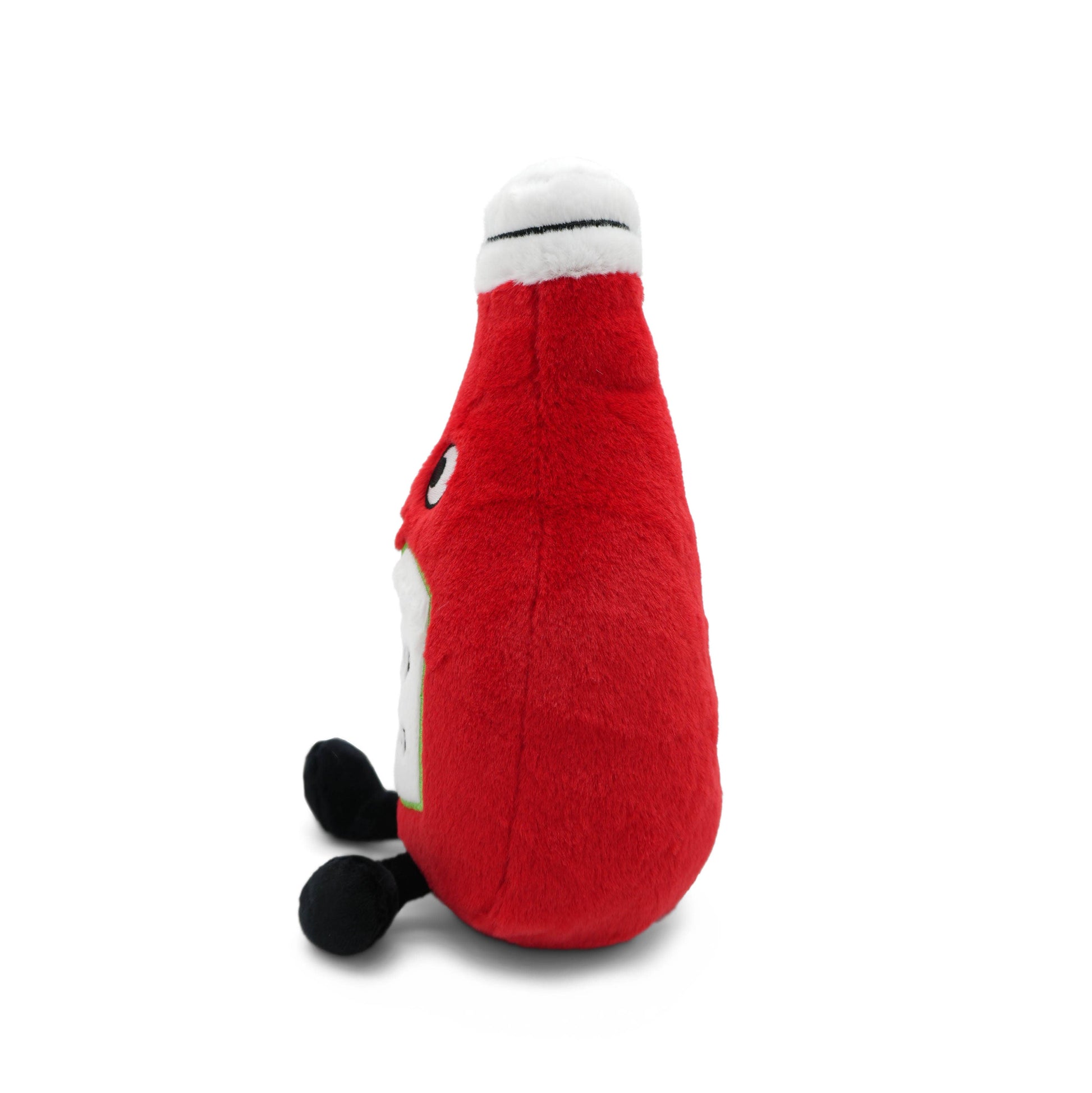 Red plush toy with black feet on a white background