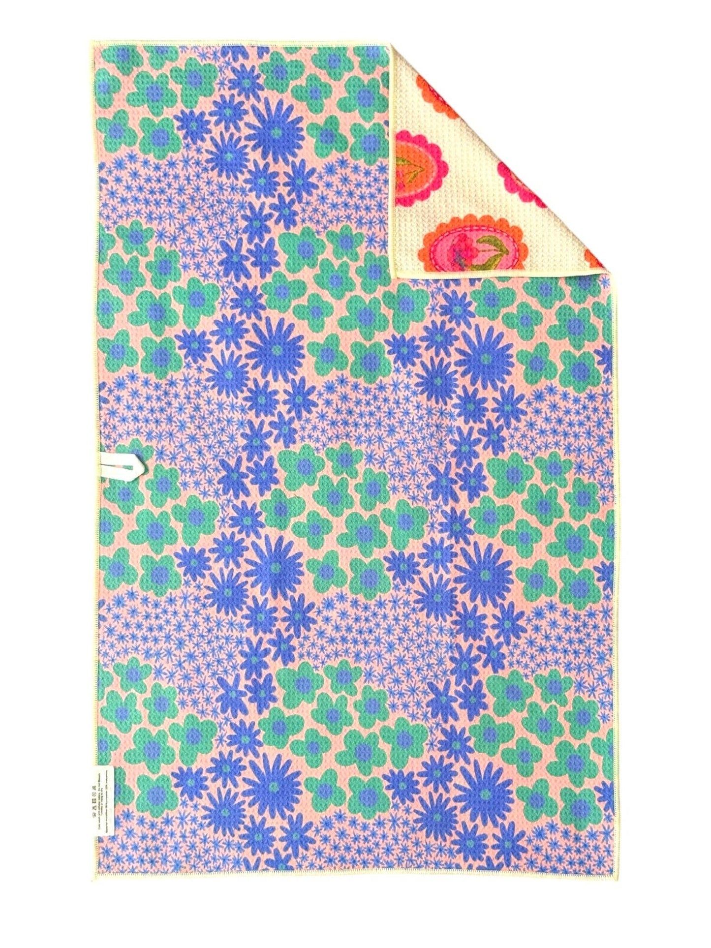 Colorful patterned fabric with floral design on a white background