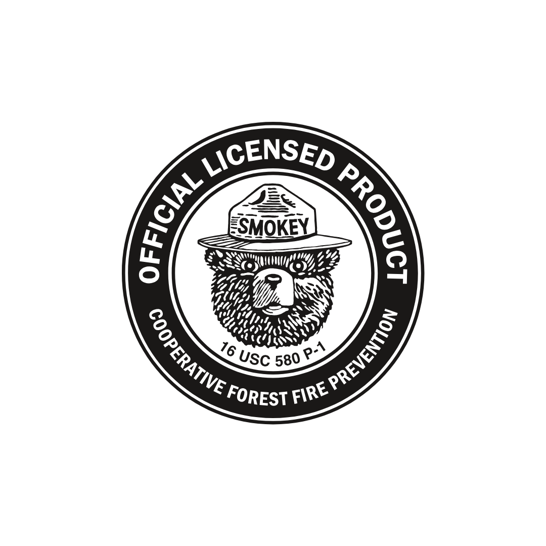 Black and white logo of Smokey the Bear with 'Official Licensed Product' text on a white background