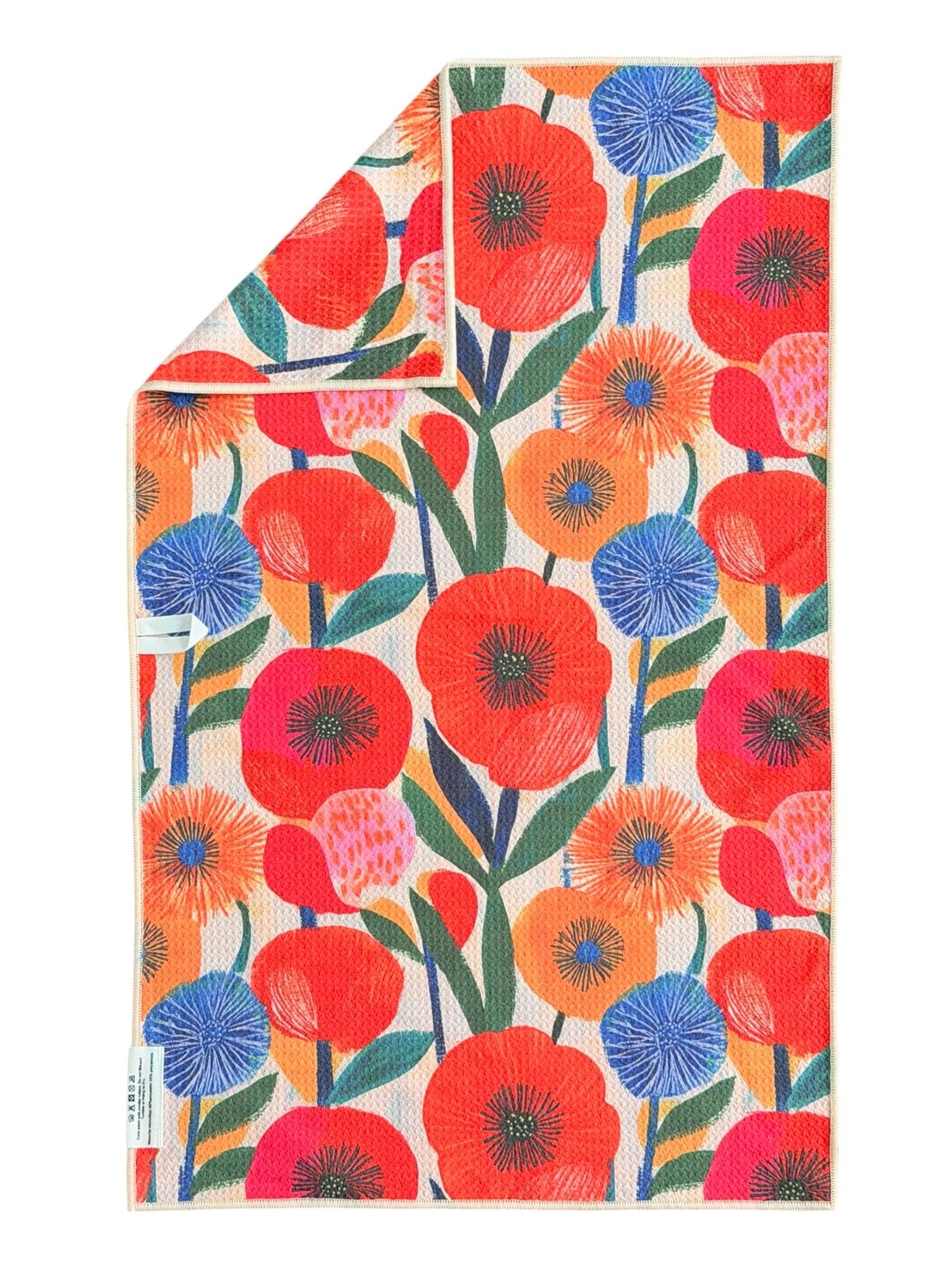 Floral patterned paper with red, blue, and orange flowers on a white background