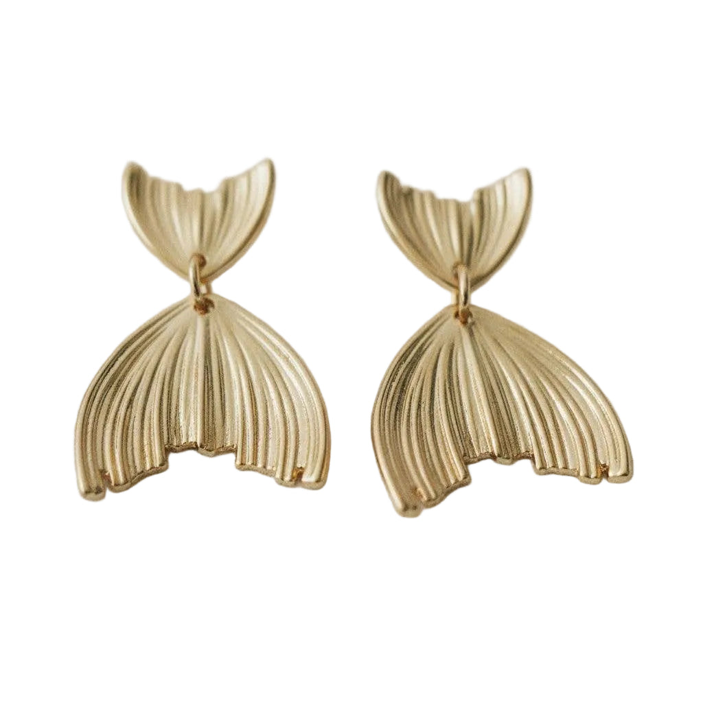 Gold mermaid tail earrings on a white background