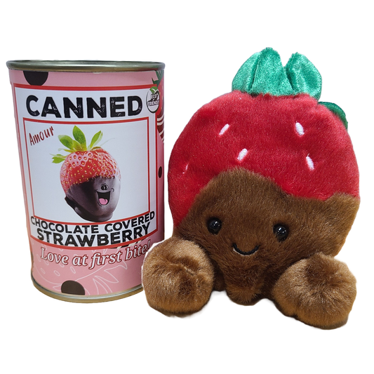 Plush toy shaped like a chocolate-covered strawberry next to a can labeled 'Canned Chocolate Covered Strawberry'.
