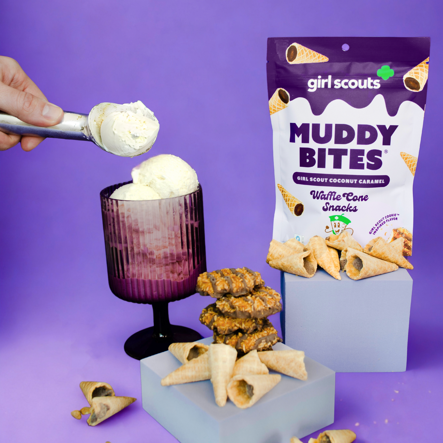 Girl Scouts Muddy Bites cookies with a scoop of ice cream on a purple background
