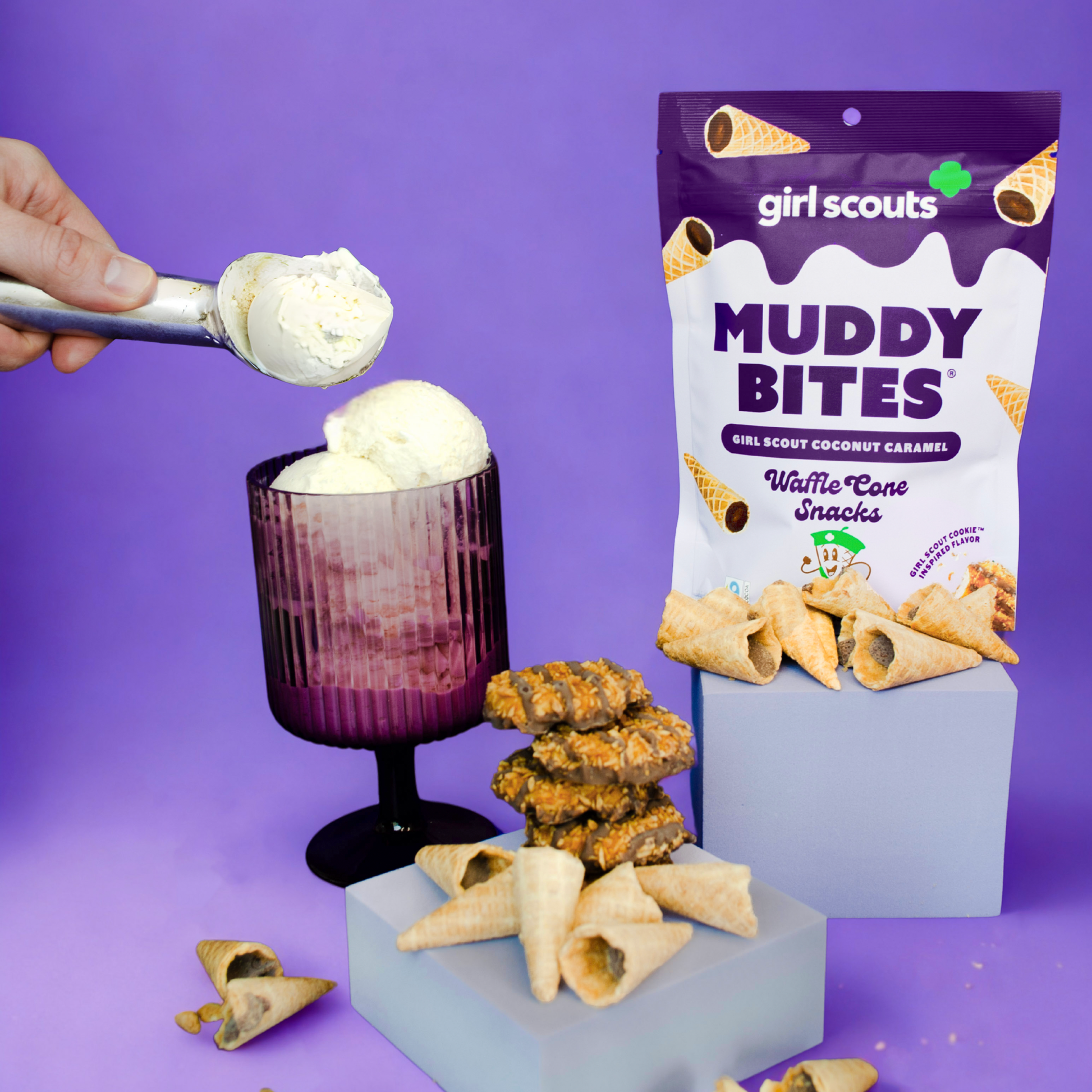 Girl Scouts Muddy Bites cookies with a scoop of ice cream on a purple background