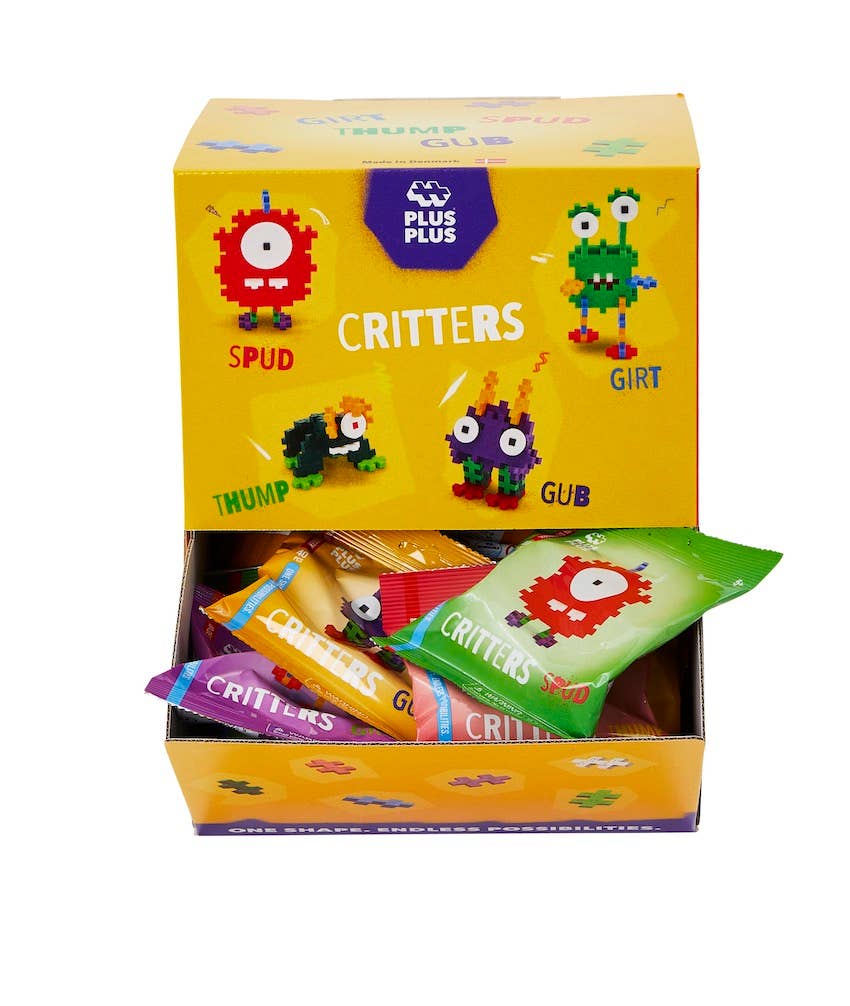 Box of Plus Plus Critters building sets with colorful packaging on a white background