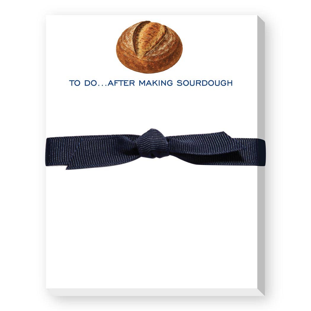 Notebook with a sourdough bread illustration and text on a white background