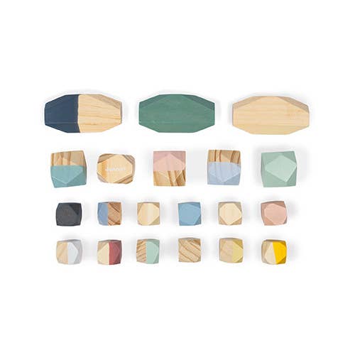 Set of colorful geometric wooden knobs on a white background