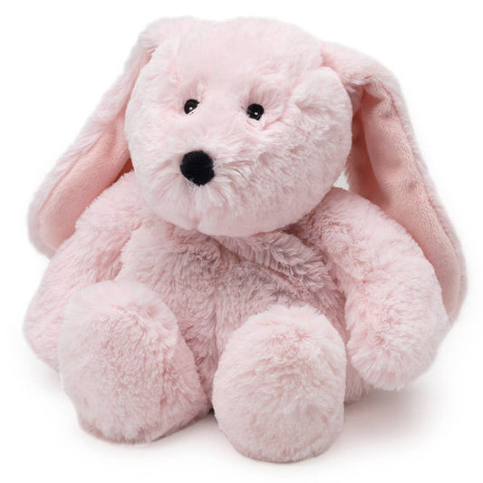 Pink plush bunny Warmies on a white background