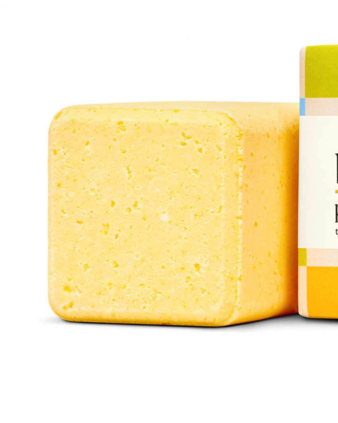 Yellow bath bomb on a white background