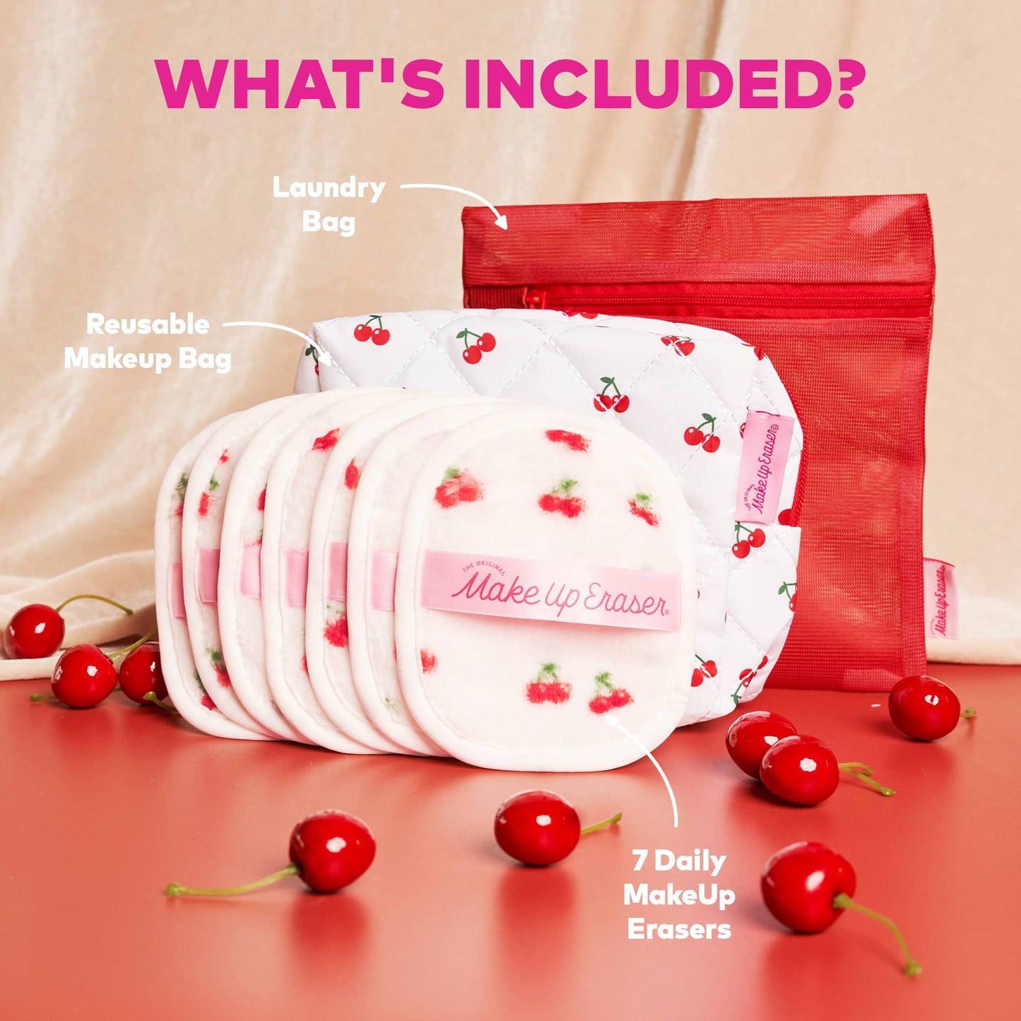 Makeup erasers with a reusable makeup bag and laundry bag on a pink background with cherries.