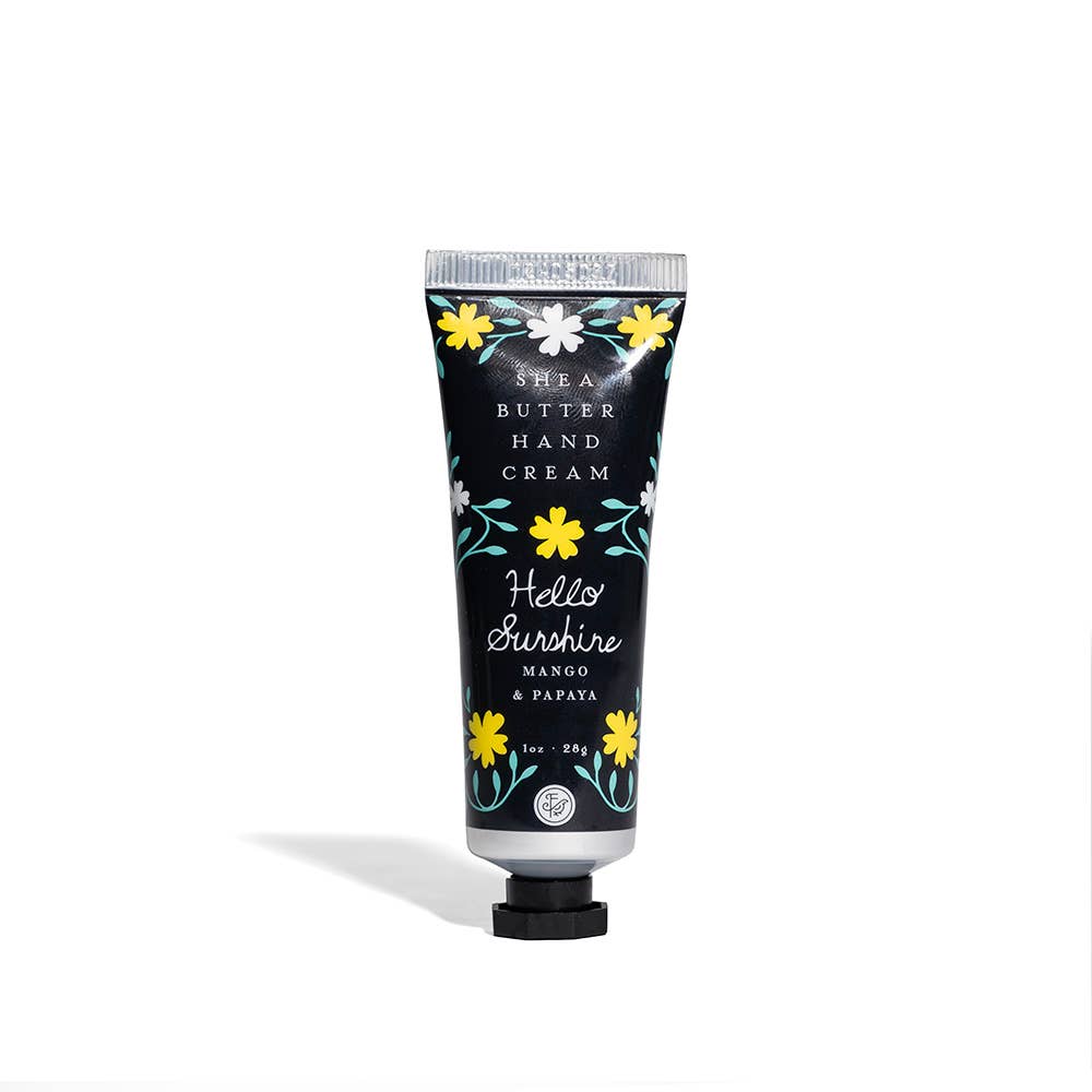Hand cream tube labeled 'Hello Sunshie' with floral design on a white background