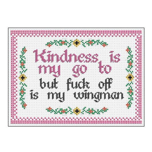 Cross-stitched design with text 'Kindness is my go to but fuck off is my wingman' on a white background.