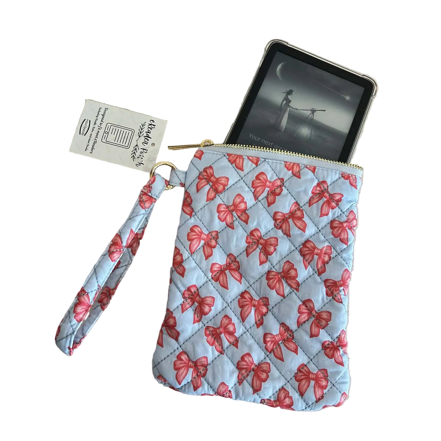 Quilted pouch with pink bow pattern on a light surface