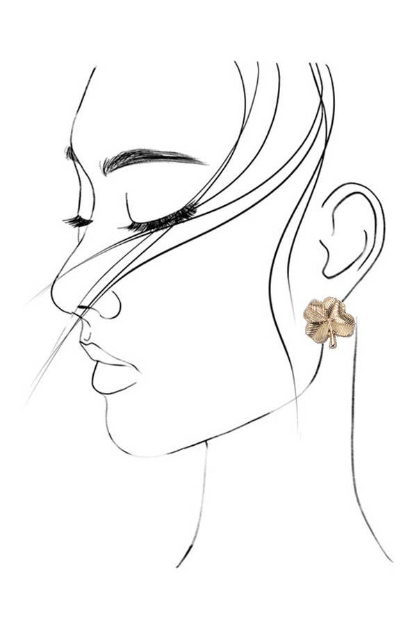 Drawing of a woman wearing a gold, four leaf clover shaped stud earrings