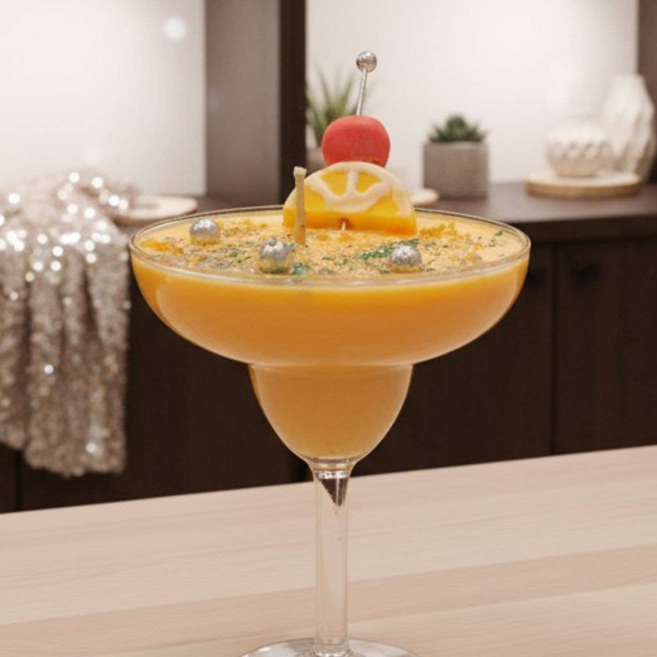 Margarita-themed candle displayed on a counter
