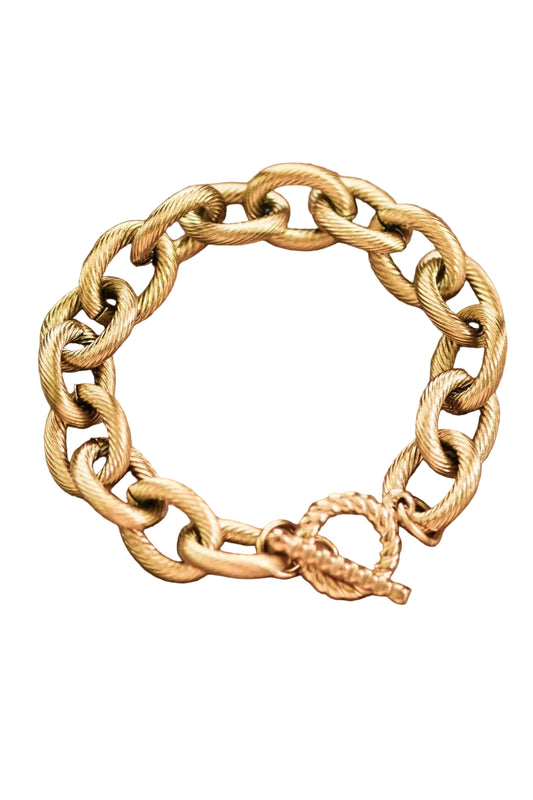 Gold chain bracelet on a white background